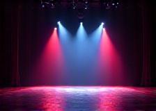 Empty theatre stage with dramatic lighting