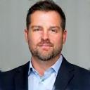 Professional headshot of Ben Carter